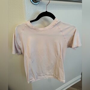 Lululemon - Cropped Light Pink Short Sleeve Top - Size Small/Size 4